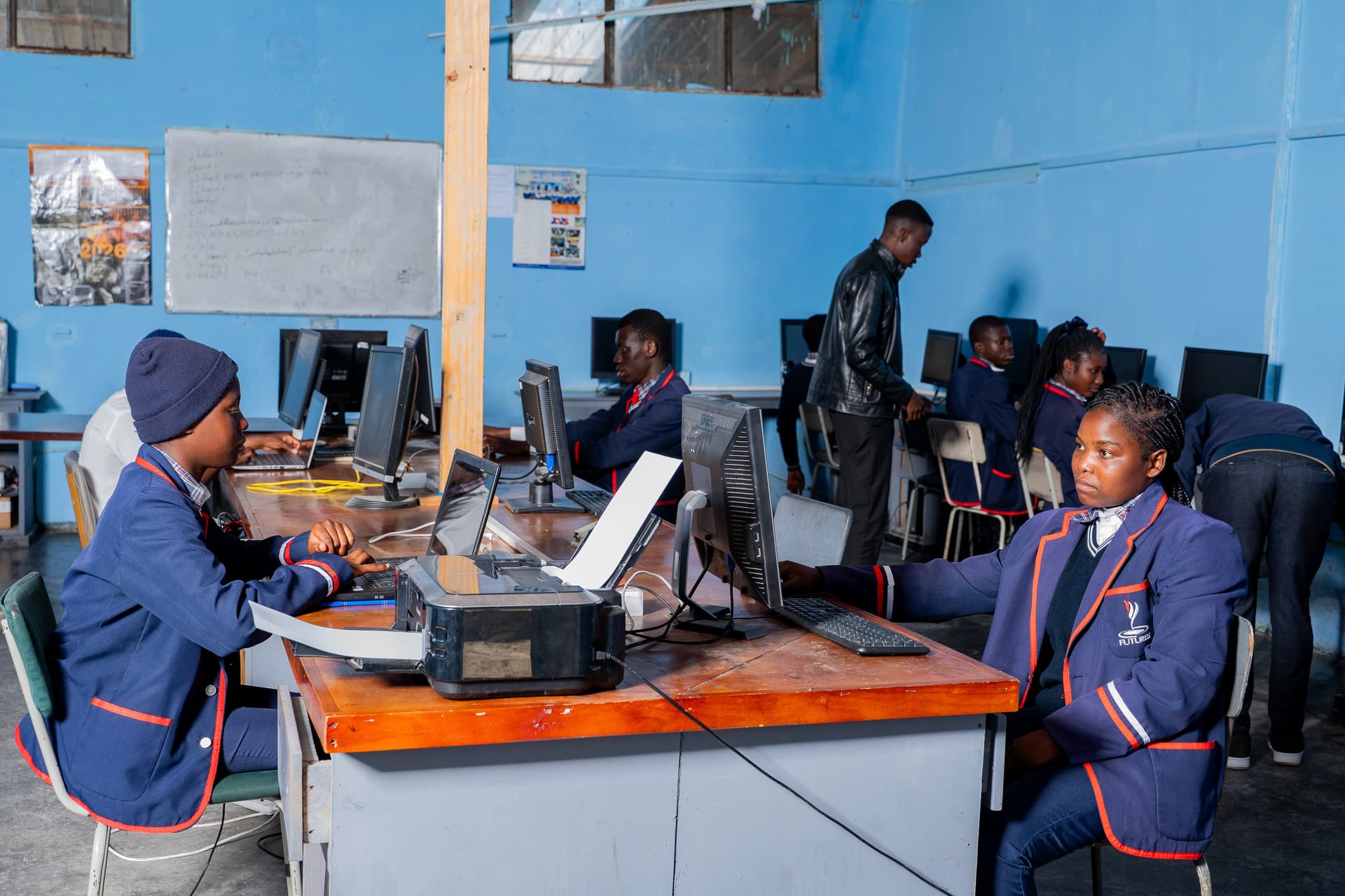 Students learning computer skills