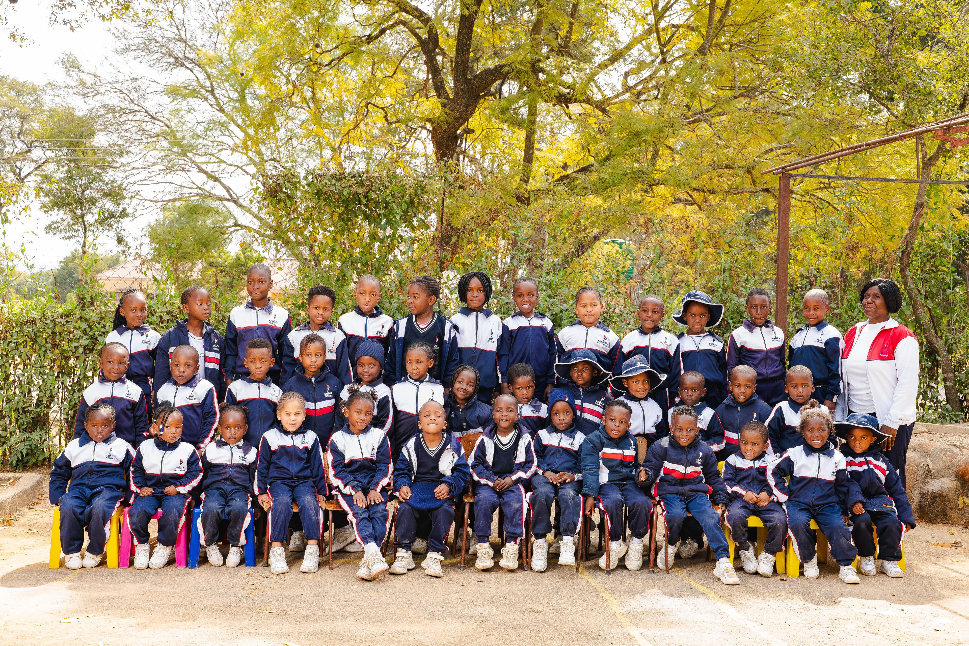 Grade 1 and grade 2 students with tracksuits