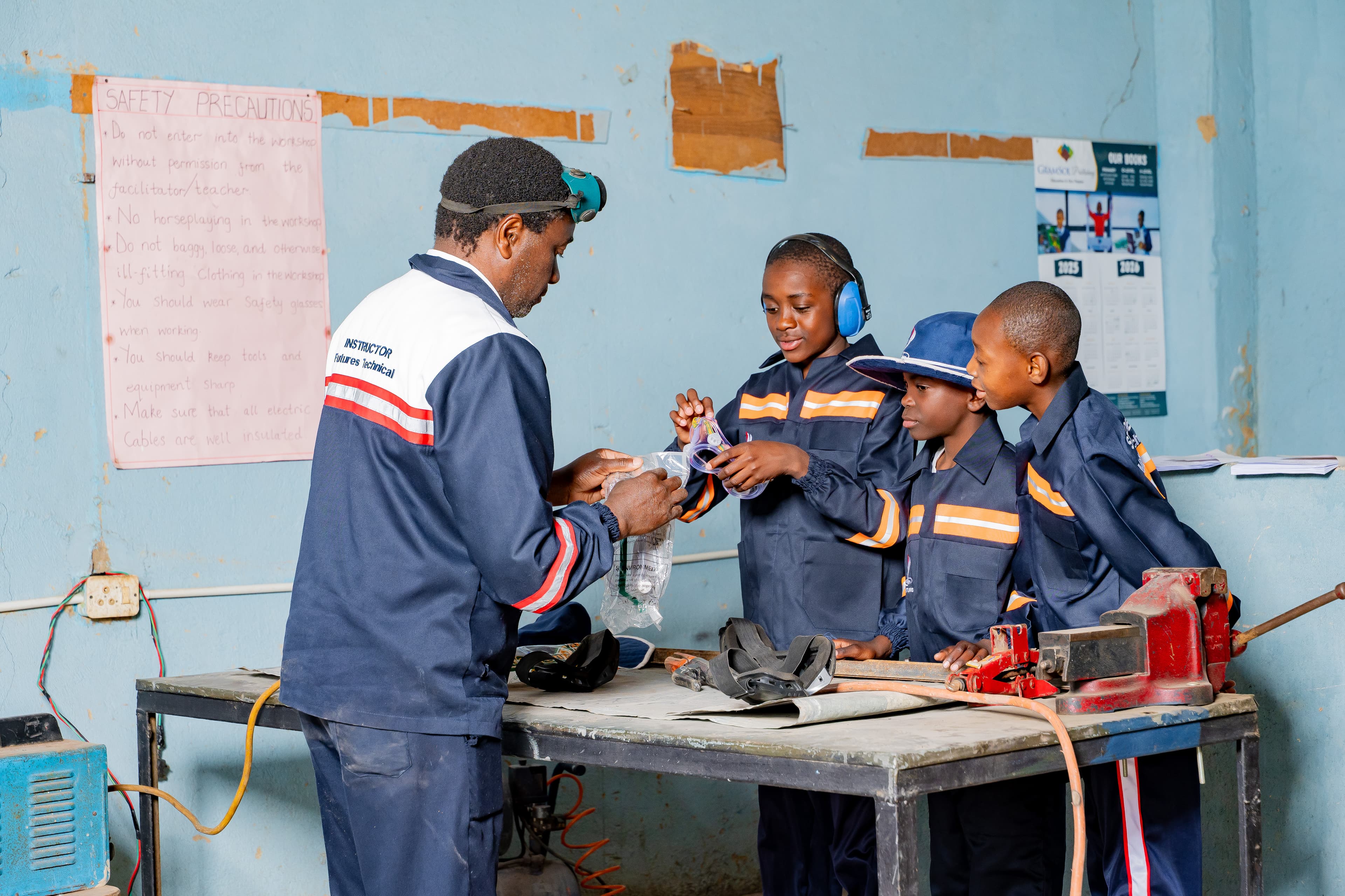 Students working on a metal work project