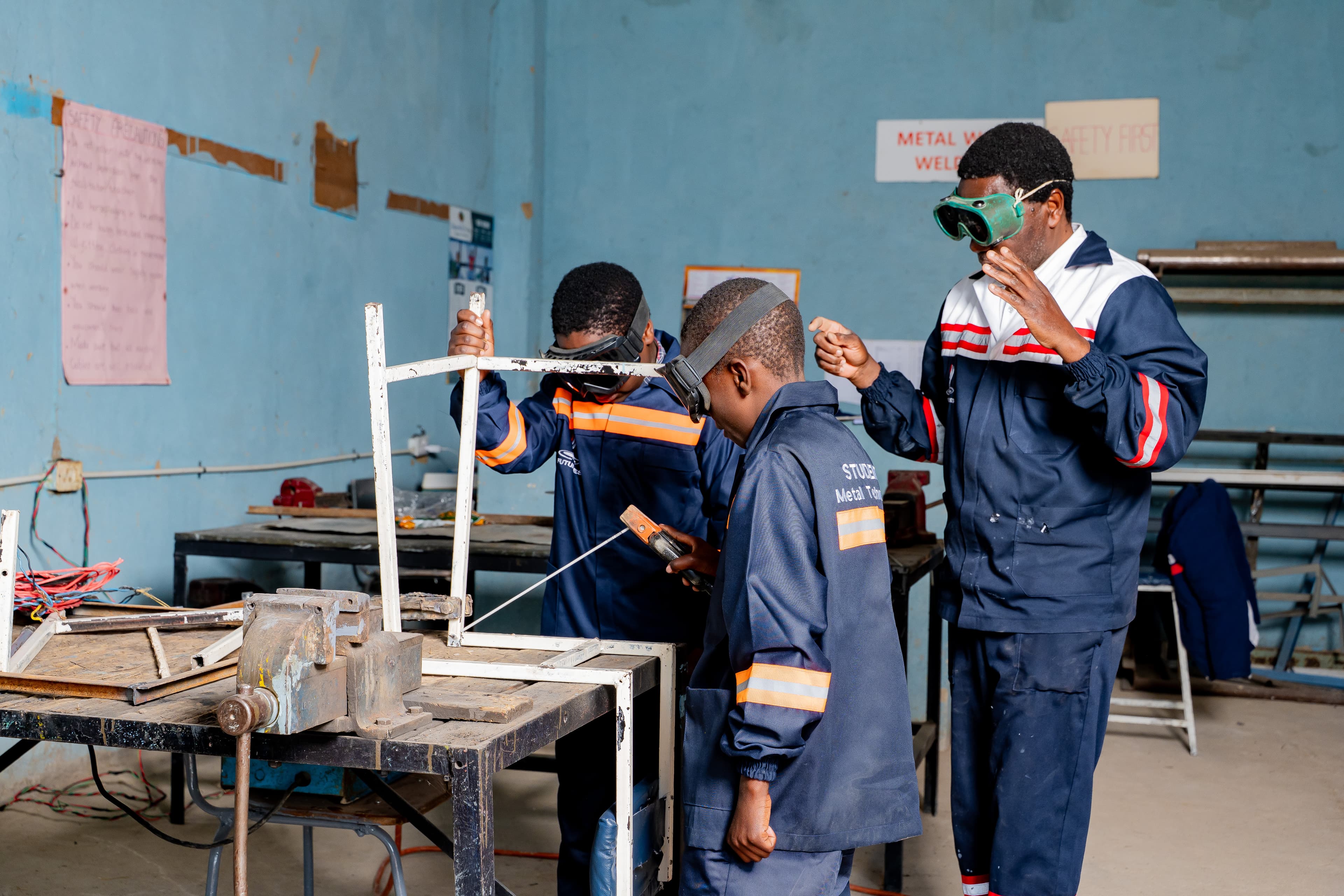 Students learning building technology