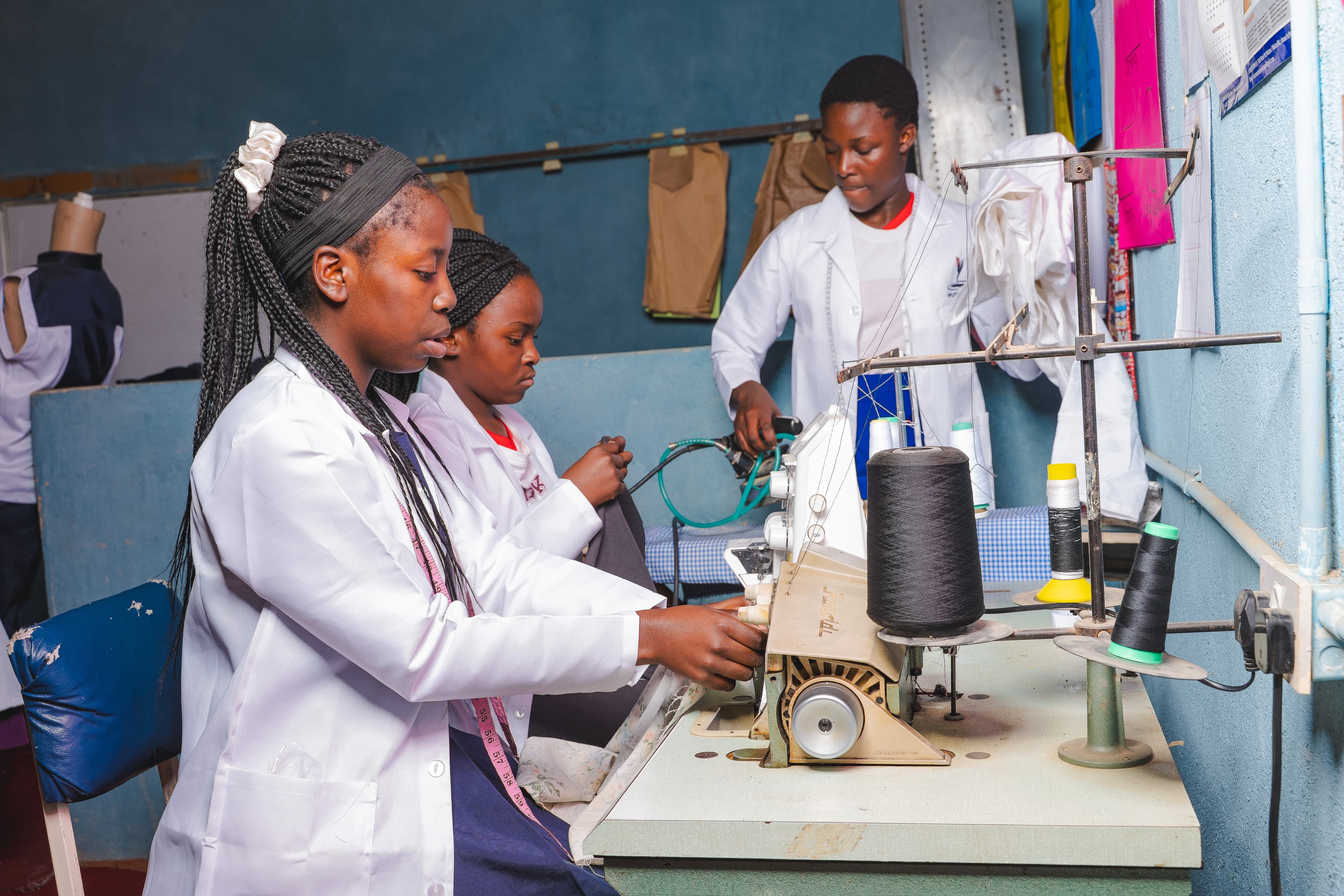 Students practicing building technology skills