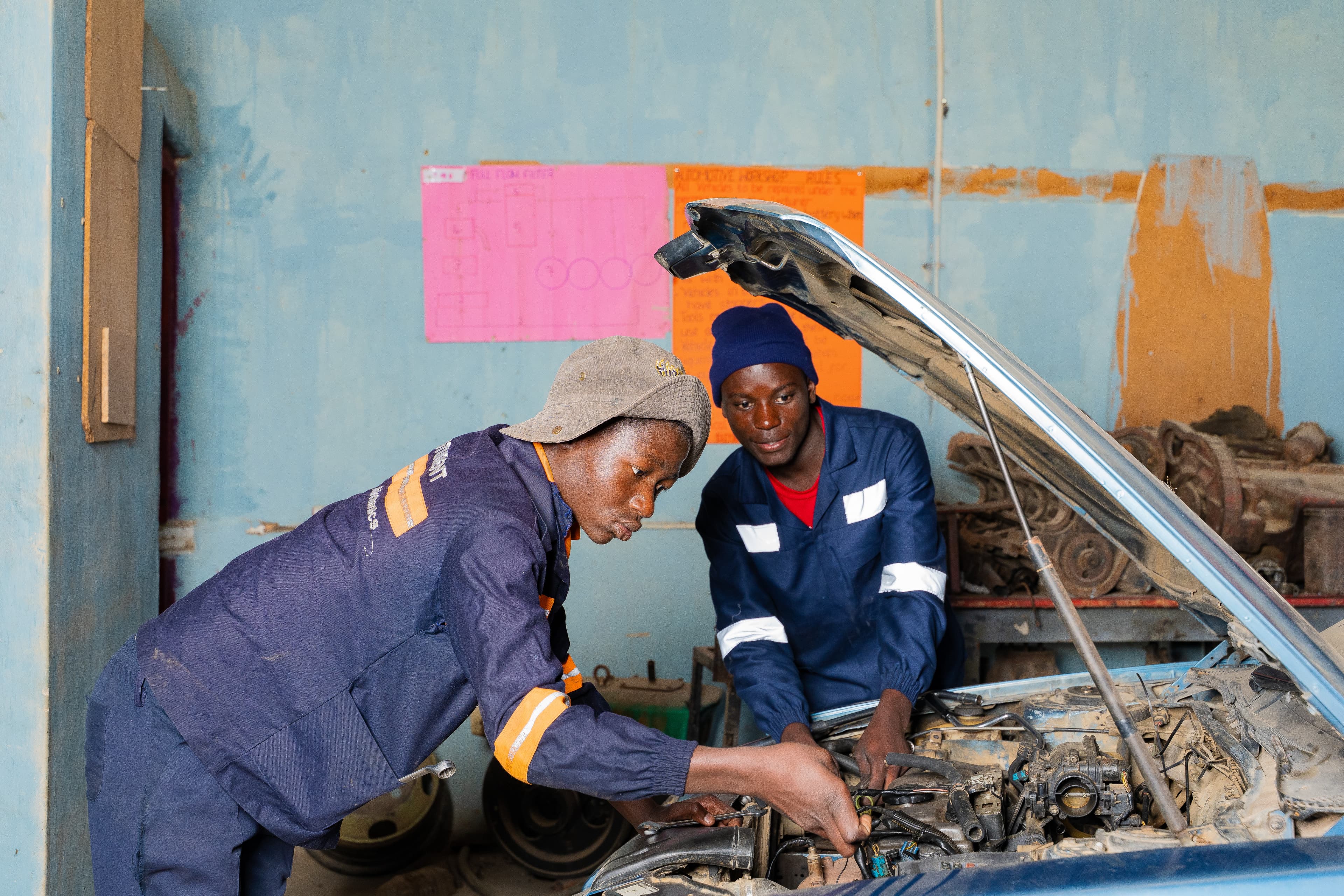 Students doing motor mechanics