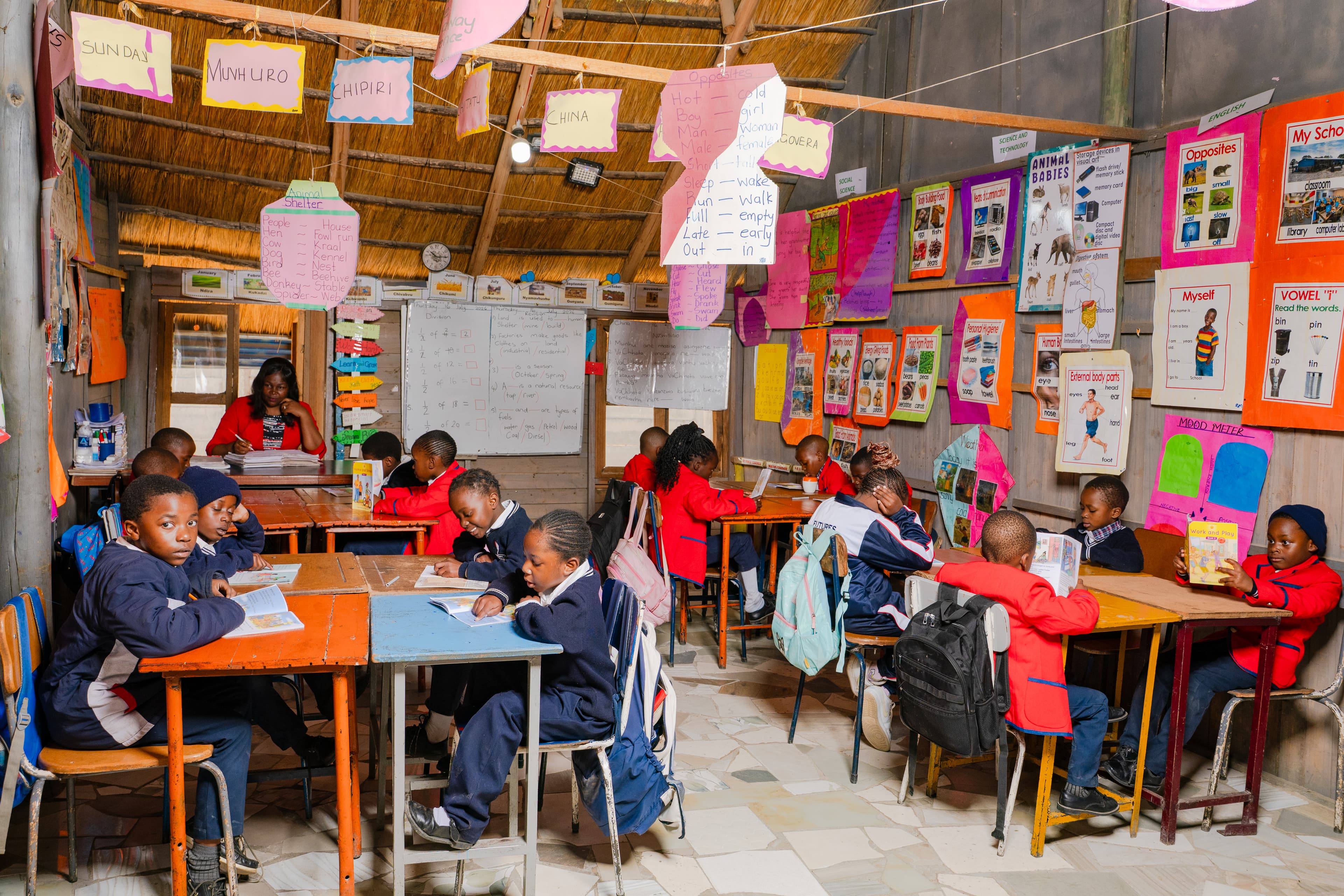 Students with their teacher in the class